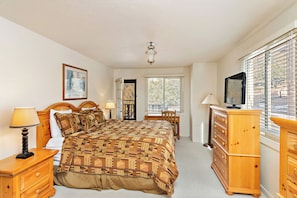 Primary Bedroom with 1 King Bed & Balcony Access