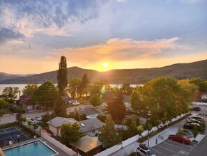 Beautiful summer sunset from your private top floor patio.