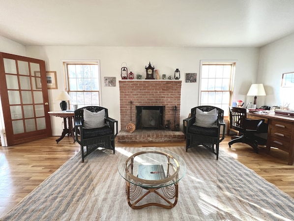 Cozy living room with working fireplace