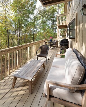 Main level deck with wooded view