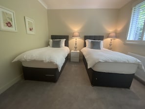 Main bedroom as  2 full single beds, on request, can convert to a Superking bed.