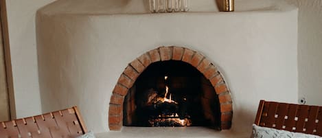 The cozy gas fireplace is easy to light and enjoy! 