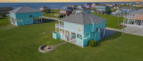 Direct beach access, private fire pit and kids playset