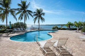 Swimming pool with hot tub