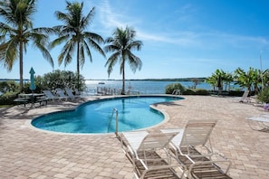 Swimming pool with hot tub