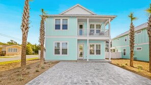 This a NEWLY BUILT luxury beach house that is 1 block away from the beach.