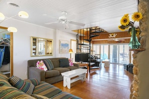 Enjoy the laid-back beach lifestyle with fantastic indoor/outdoor living options on both levels of the home.