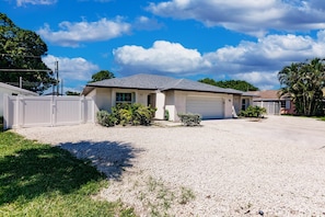 Entrance on Left side of the house when facing building. NO GARAGE!