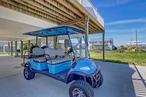 6 passenger street legal golf cart- Available for an additional daily fee. 