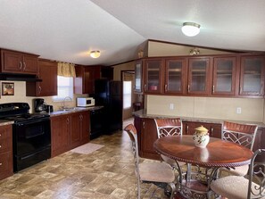 Kitchen/Dining. Kitchen has all amenities including coffee maker and microwave.