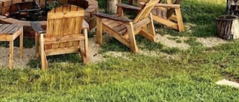 Fire Pit w/ Adirondack chairs - shared space.