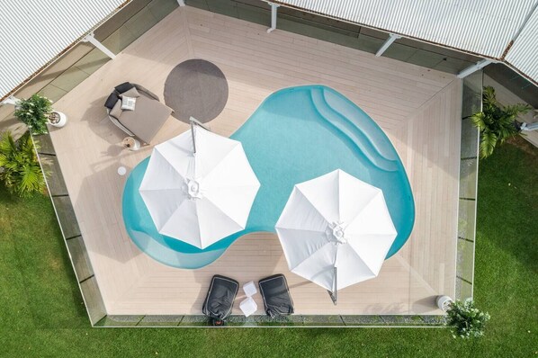 Magnesium pool with floating bean bag chairs