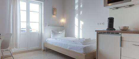 Studio Halden, 10qm, 1 Wohn-/Schlafzimmer, Bad, max. 1 Person-Escasa Ferienwohnungen