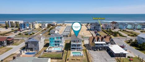 Turning Tide: Aerial rear exterior view & beach access