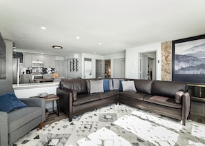 Living room with plenty of seating and spectacular slope-facing views