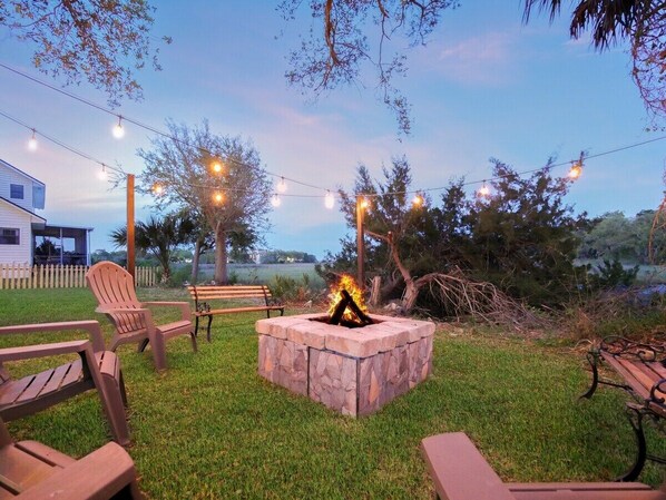 Have a gathering at the firepit! Roast some s'mores, take in the sounds of the Marsh. These lights are easily turned on and off with the flip of a switch