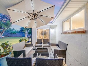 This umbrella lights up to provide ambient lighting. Bright enough to light up the space, but not too bright to cut out the stars