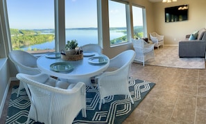 Gorgeous lake view in sunroom! Couch is queen pullout.