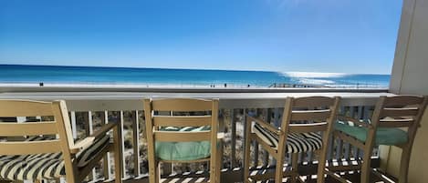 Balcony wide bar top with seating and Gulf view.