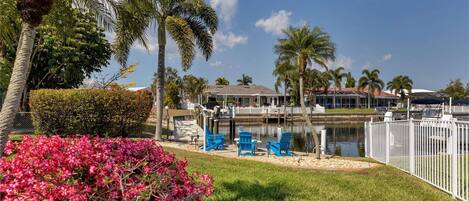 Gorgeous landscaping at this canalfront home in Punta Gorda Isles
