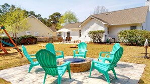 Enjoy a cookout or sit by the fire pit while the kids play. (Fire Pit Wood is not provided)