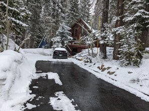 long driveway, snow plowed in winter