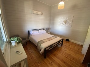 Spacious Queen sized bedrooms with individual split system heating and cooling.