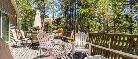 Expansive deck to enjoy during your stay.  (Photos don't depict actual furnishings).