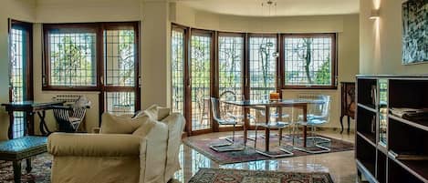 Living Room with access to Terrace overlooking the Condo Park