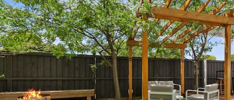 Gorgeous outdoor area with seating, BBQ and firepit