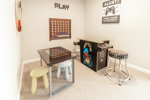 Huge TV and large couch in the basement game/media room to entertain all the guests for hours!  Wifi enabled smart TV.