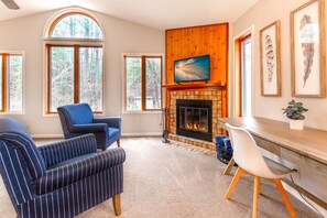 Huge master bedroom with king bed, real wood fireplace and wifi-enabled smart tv