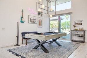 Plenty of ways to play and keep your group entertained, including a bright pool table area.