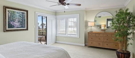Expansive master bedroom with en-suite lanai access and bathroom