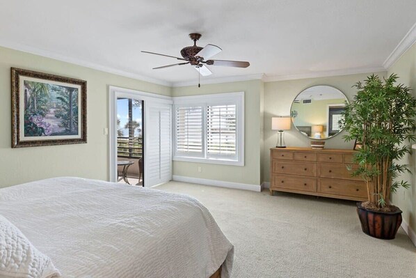 Expansive master bedroom with en-suite lanai access and bathroom