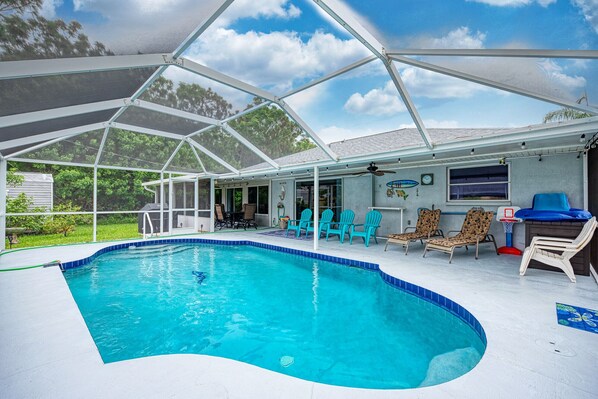 The pool is calling- Heated private pool with privacy fence.