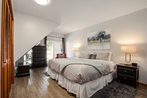 Master bedroom with ensuite, king size bed & private balcony