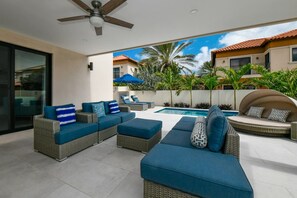 Relax in one of the many lounging areas in our private backyard