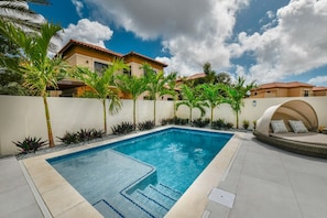 Daybed for lounging poolside in our private backyard