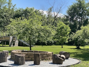 Backyard Playset and Rustic Fire Pit