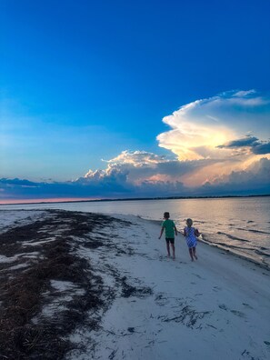 Sunset walk on Alligator Point at Bald Point Beach