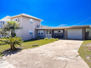 Tarpon Point Beach House Front of House. Bungalow style. Front porch.