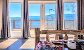 How about waking up to this breathtaking layers of AMAZING mountain views from the upper master bedroom, complete with your own private deck. Stay with us and experience the difference!