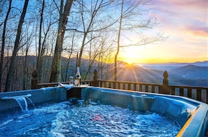 Picture yourself soaking in a hot tub under a sky full of stars, surrounded by GORGEOUS mountain views and nature! Reminder: Glassware seen in photos is for decorative purposes only. For safety, no glassware or alcohol near the hot tub.