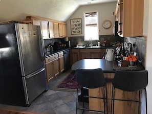 Full kitchen with all necessities.