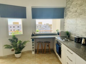 New kitchen with breakfast bar 