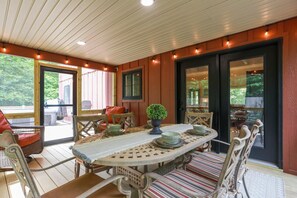 The oversized screened porch will be your favorite spot for morning coffee