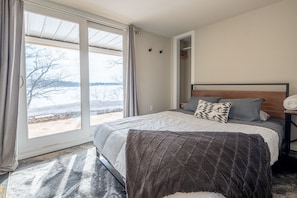 Downstairs queen bedroom with lake views. Wake up to the sounds of loons. 