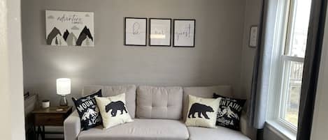 Living Room pull out sofa easily converts to full size bed.