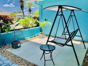 Front patio with sitting swing